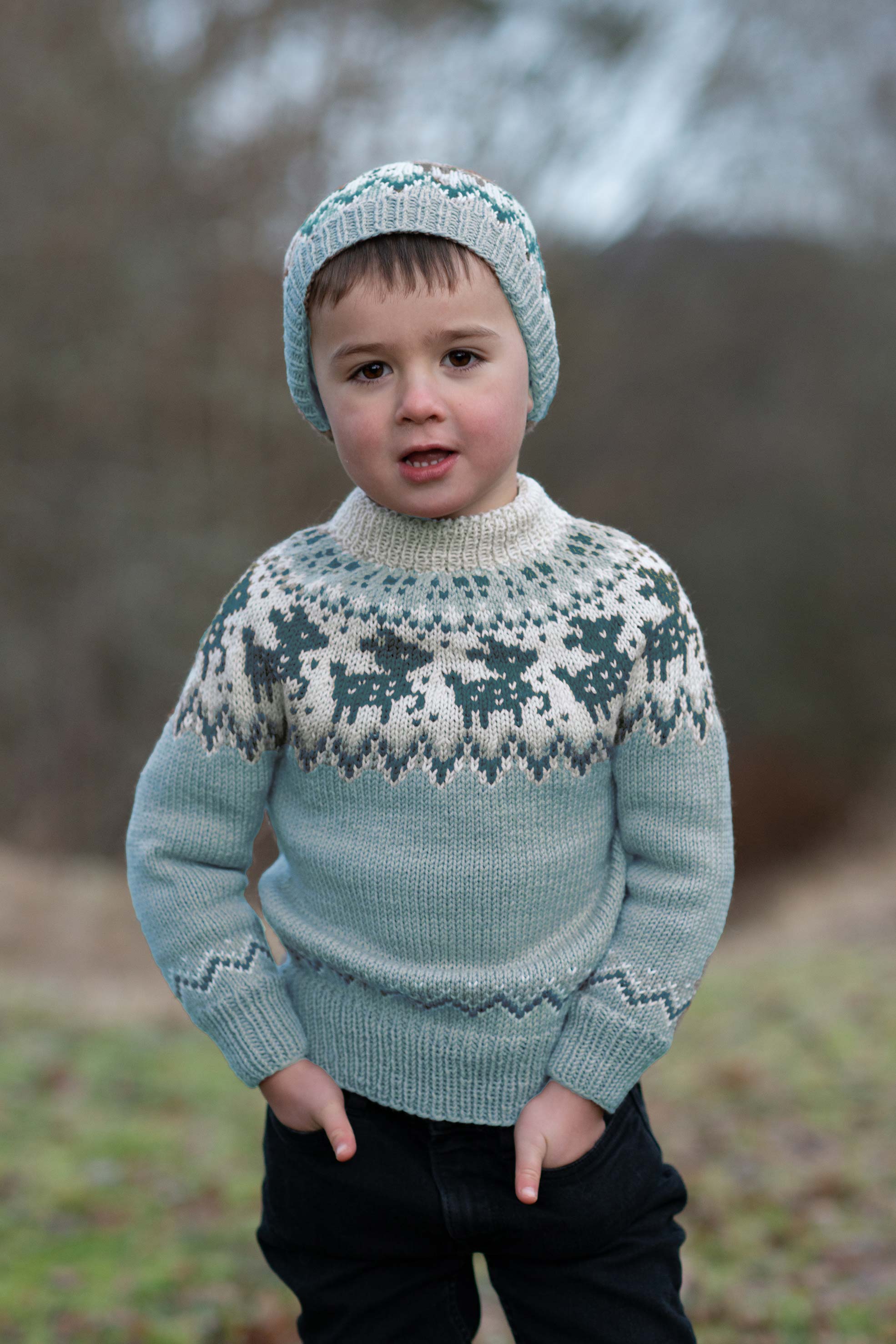 FAUNA trøje og hue lys petrol