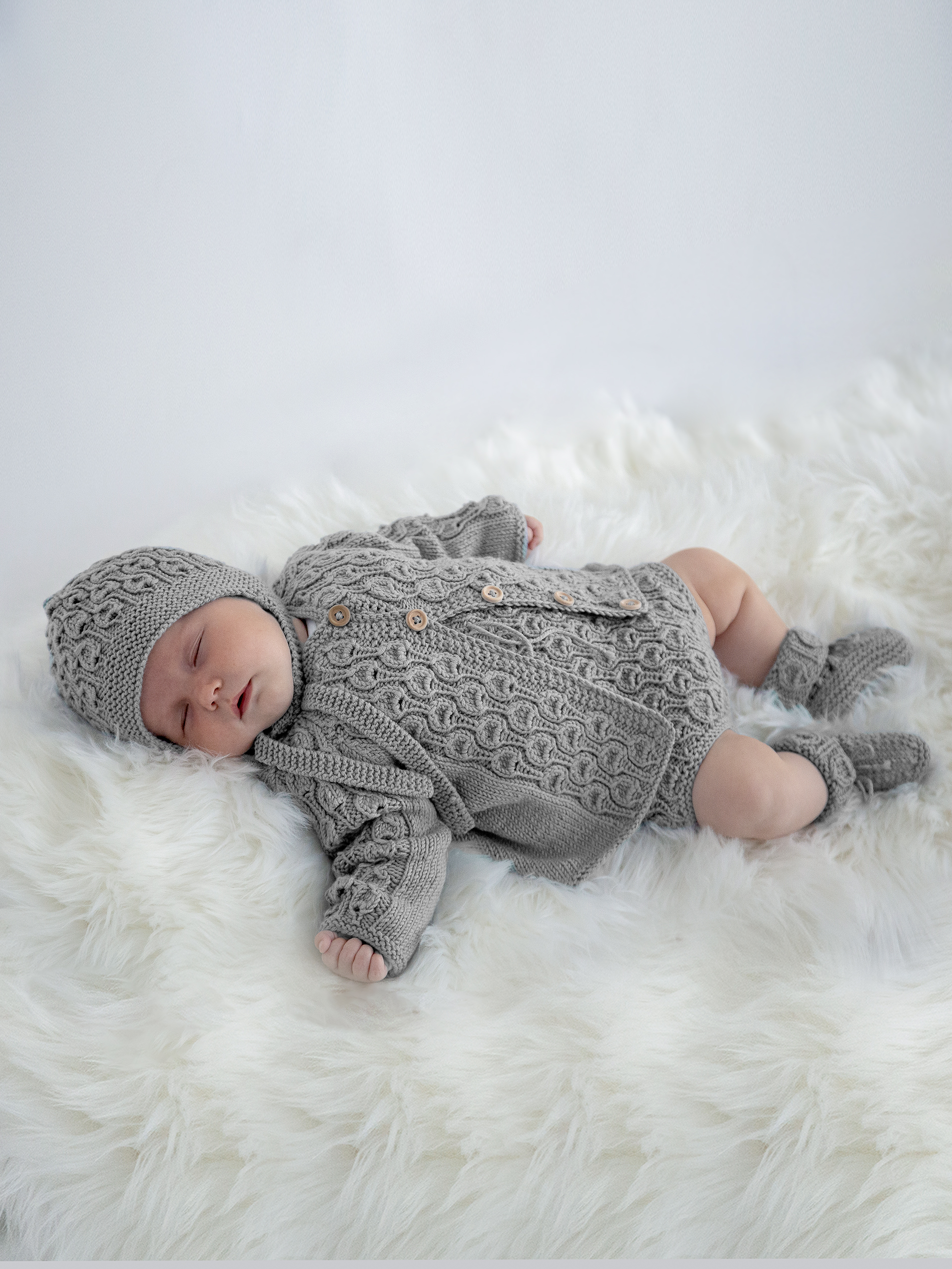 Vugge rompersæt grå