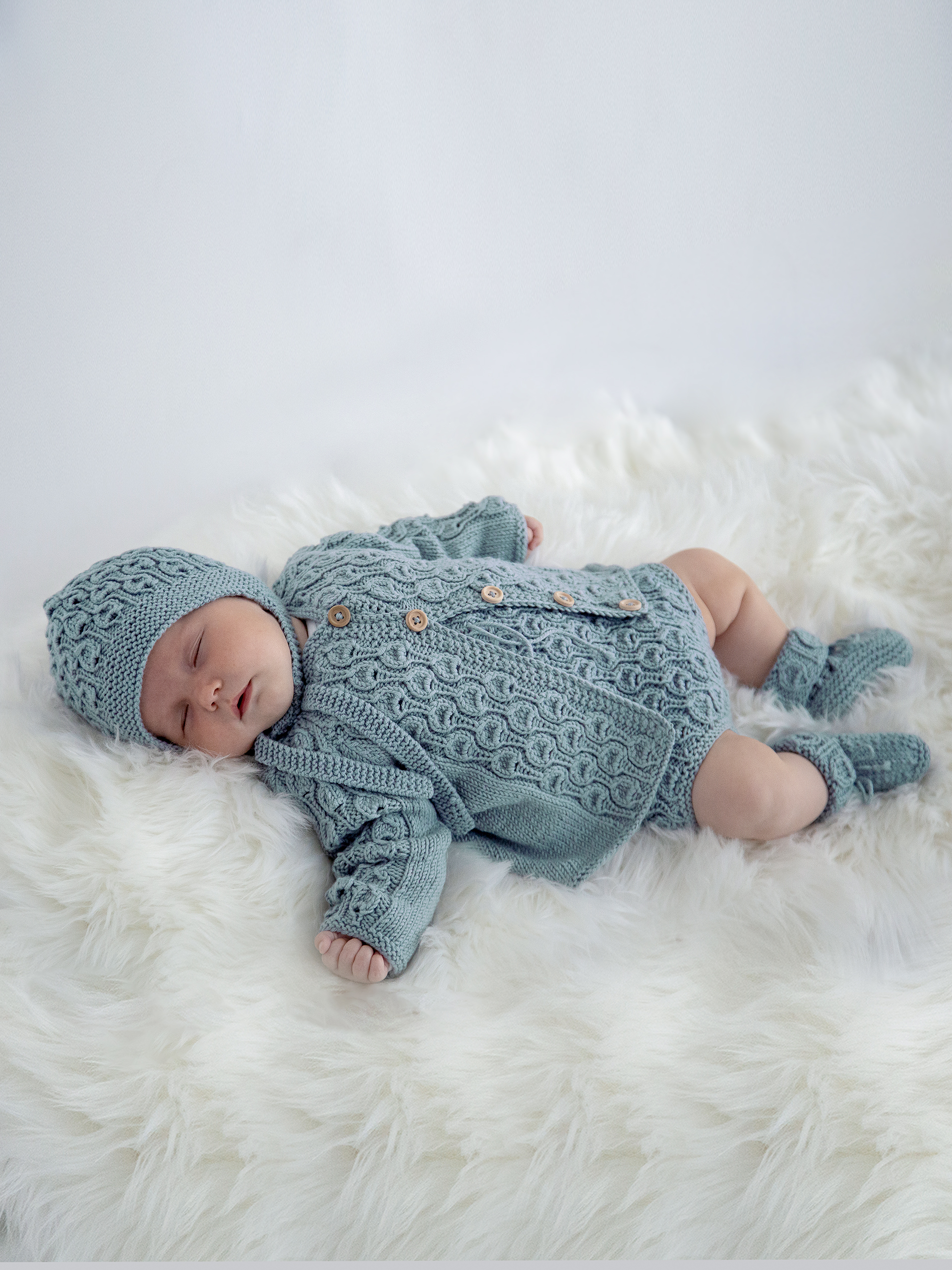 Vugge rompersæt lys petrol